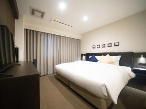 Postel nebo postele na pokoji v ubytování Hotel Shuranza Chiba + 37 fotografií