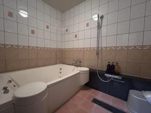 Koupelna v ubytování ホテル オアシス + 20 fotografií