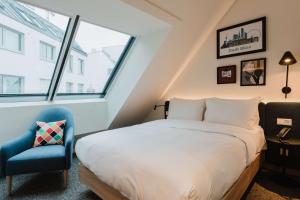 Кровать или кровати в номере Hampton By Hilton Vienna City West +37 фотографий