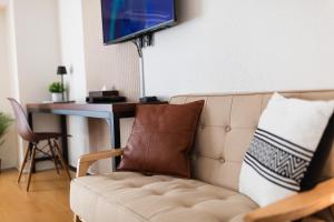 TV a/nebo společenská místnost v ubytování b&天下茶屋店