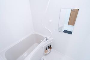 Koupelna v ubytování b&天下茶屋店