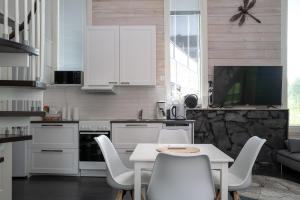 Η κουζίνα ή μικρή κουζίνα στο Holiday Cabin Pikkuleijona