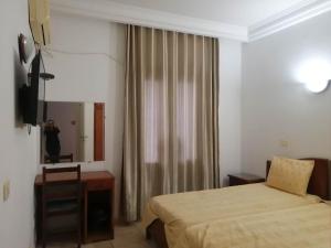Postel nebo postele na pokoji v ubytování Hotel El Layeli