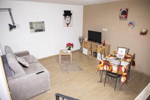 a living room with a couch and a table at Vecchia Napoli apt 20 in Naples