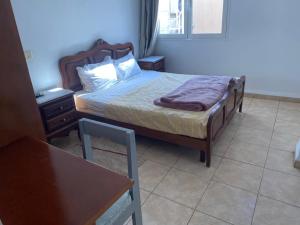 Postel nebo postele na pokoji v ubytování Hotel El Layeli