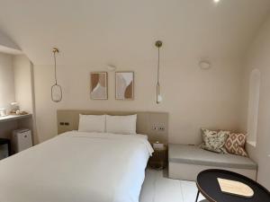 Letto o letti in una camera di Little Greece