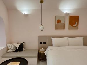 Letto o letti in una camera di Little Greece