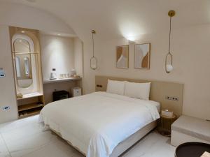 Letto o letti in una camera di Little Greece