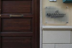 Certifikát, hodnocení, plakát nebo jiný dokument vystavený v ubytování Reggio Charme