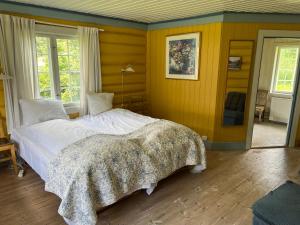 Postel nebo postele na pokoji v ubytování Sevletunet B&B and Cabins