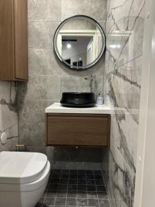 Koupelna v ubytování Lapland Dream House + 2 fotografie