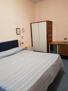 Postel nebo postele na pokoji v ubytování Meublè Andrea Doria