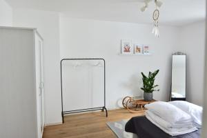 Postel nebo postele na pokoji v ubytování Zugspitze Street Apartment