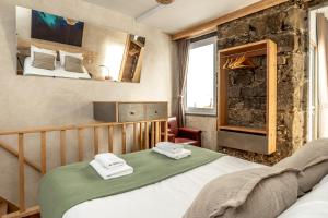 En eller flere senge i et værelse på Knock Knock II