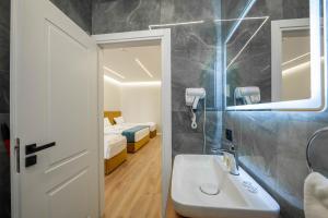 Vannituba majutusasutuses Golemi Lux Hotel