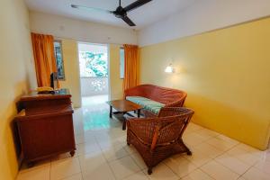 Posezení v ubytování Virgo Batik Resort Teluk Batik Lumut