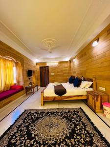 En eller flere senger på et rom på Garh Villa Jaisalmer