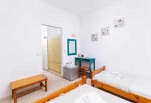 Postel nebo postele na pokoji v ubytování Eva Marina Hotel