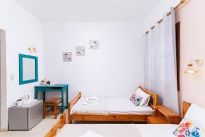 Postel nebo postele na pokoji v ubytování Eva Marina Hotel