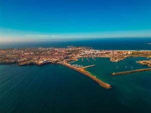 an aerial view of a city on the water at Sea Garden Peniche in Peniche