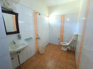 Koupelna v ubytování Hotel RJ INN
