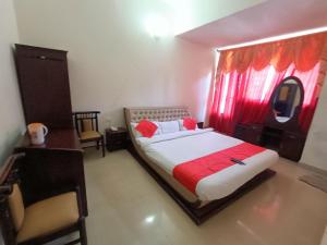 Postel nebo postele na pokoji v ubytování Hotel RJ INN