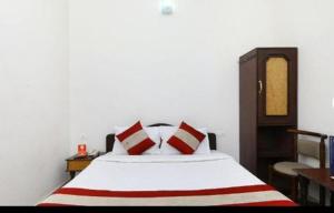 Postel nebo postele na pokoji v ubytování Hotel RJ INN