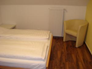 Ένα ή περισσότερα κρεβάτια σε δωμάτιο στο Hotel Gregory