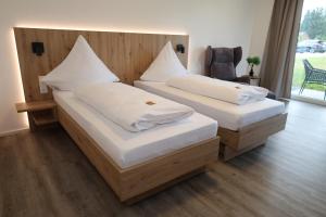 Postel nebo postele na pokoji v ubytování MEIN MOTEL - Self Check-in