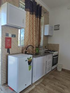 Køkken eller tekøkken på Sirocco Apartments