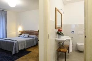 Posteľ alebo postele v izbe v ubytovaní Agriturismo Rivella