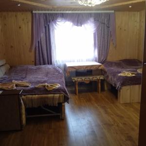 Postel nebo postele na pokoji v ubytování микуличин на долоні