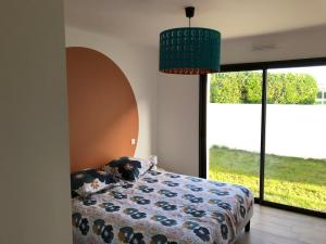 Postel nebo postele na pokoji v ubytování villa d'Alexandrine + 20 fotografií