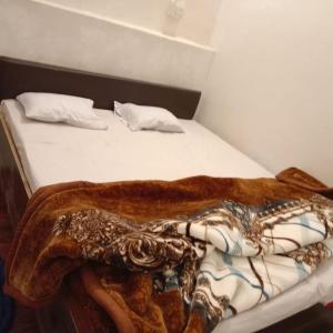 Voodi või voodid majutusasutuse Nine Inn Hotel and Restaurant toas +7 fotot