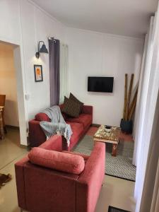TV a/nebo společenská místnost v ubytování The Cosy Suite