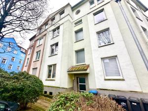 a large white building with a lot of windows at Scandinavian Relax, Netflix, central, keyless in Essen