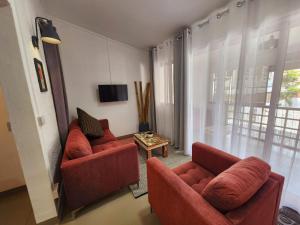 TV a/nebo společenská místnost v ubytování The Cosy Suite