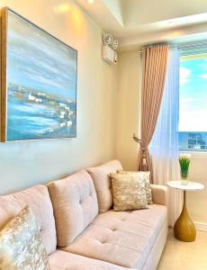 Predel za sedenje v nastanitvi La Mirada Deluxe Suites with Oceanview