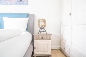 Postel nebo postele na pokoji v ubytování Strandhaus Zingst Apartment 03