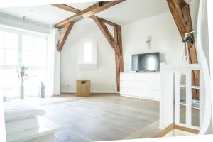 Μια τηλεόραση ή/και κέντρο ψυχαγωγίας στο Darßer Mühle +15 φωτογραφίες