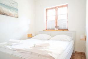 Postel nebo postele na pokoji v ubytování Holzkate