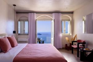 Postel nebo postele na pokoji v ubytování Andromeda Villas & Spa Resort + 37 fotografií