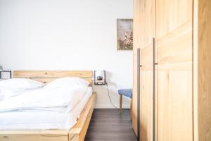 Postel nebo postele na pokoji v ubytování Seemannshus