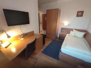 Postel nebo postele na pokoji v ubytování Hotel Landgasthof Euringer