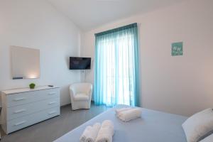 Katil atau katil-katil dalam bilik di Icaro Apartments with a beautiful pool +60 gambar