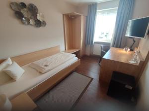 Postel nebo postele na pokoji v ubytování Hotel Landgasthof Euringer