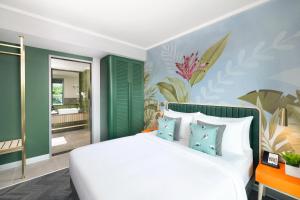 Voodi või voodid majutusasutuse ibis Styles Mysuru toas