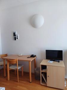 TV a/nebo společenská místnost v ubytování Centrum Mariapoli
