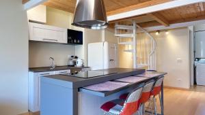 Kuchyň nebo kuchyňský kout v ubytování Sky Apartment - Affitti Brevi Italia