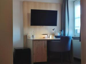 TV a/nebo společenská místnost v ubytování Hotel Landgasthof Euringer